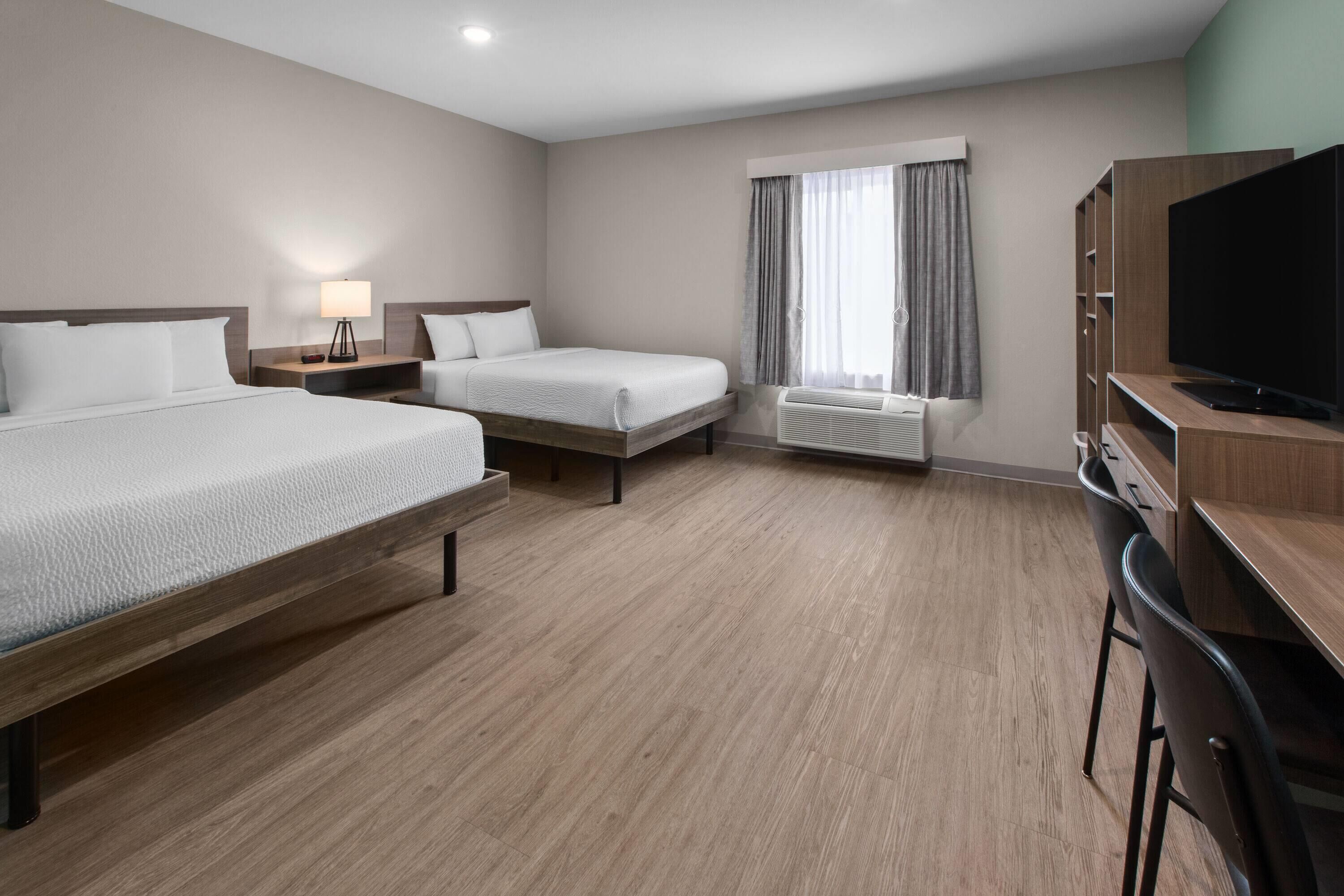 Room, 2 Queen Beds, Mobility Accessible, Non Smoking (Bathtub W/grab Bars) | Desk, laptop workspace, blackout drapes, free WiFi