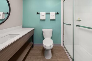Suite, 1 Queen Bed, Non Smoking | Bathroom | Towels, toilet paper