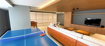 Apto c Wi-fi Academia sal o de Jogos e Garagem