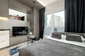 Tabla de planchar con plancha, cuna de viaje, wifi y ropa de cama 
