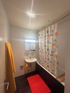 Shower, towels, soap, toilet paper