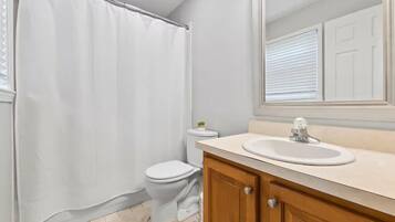 Shower, towels, soap, toilet paper