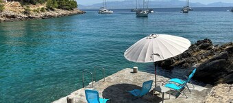 Charming 2-bedroom house in wonderful Rogač with AC situated 30 metres from sea.