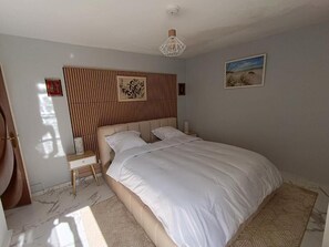 1 slaapkamer, een strijkplank/strijkijzer, wifi, beddengoed