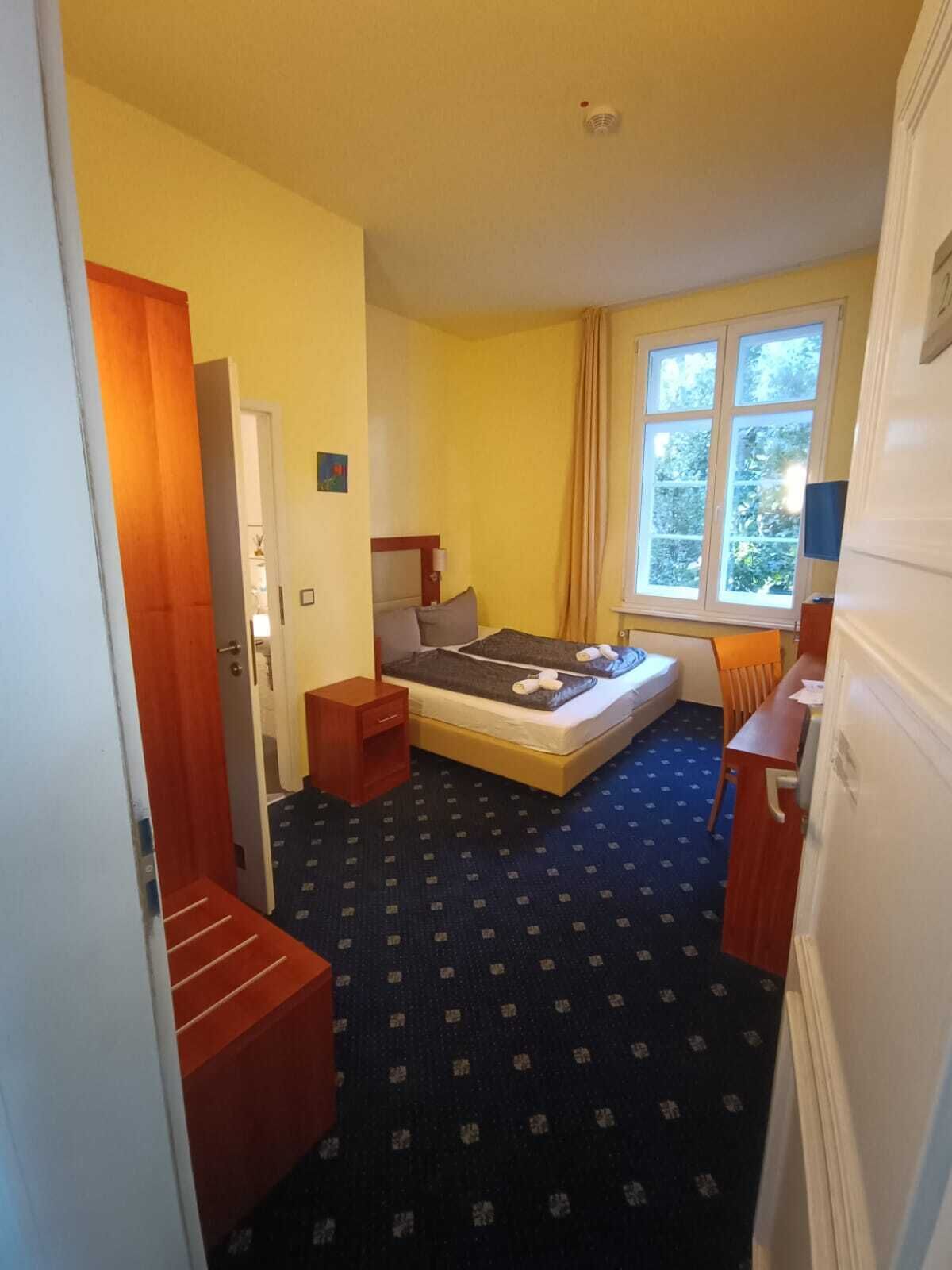 Habitación Confort, en esquina | Minibar, wifi gratis, ropa de cama