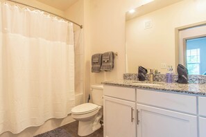 Shower, hair dryer, shampoo