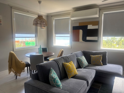 Enjoy and relax! Spacious 2/2, ocean views, gym,& pool, in lovely Montego Bay!