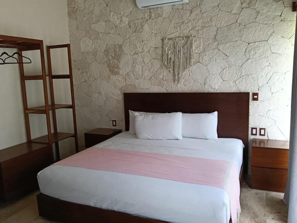 Apartamento família, varanda, vista para o jardim | Frigobar, cofres nos quartos, ferros/tábuas de passar roupa