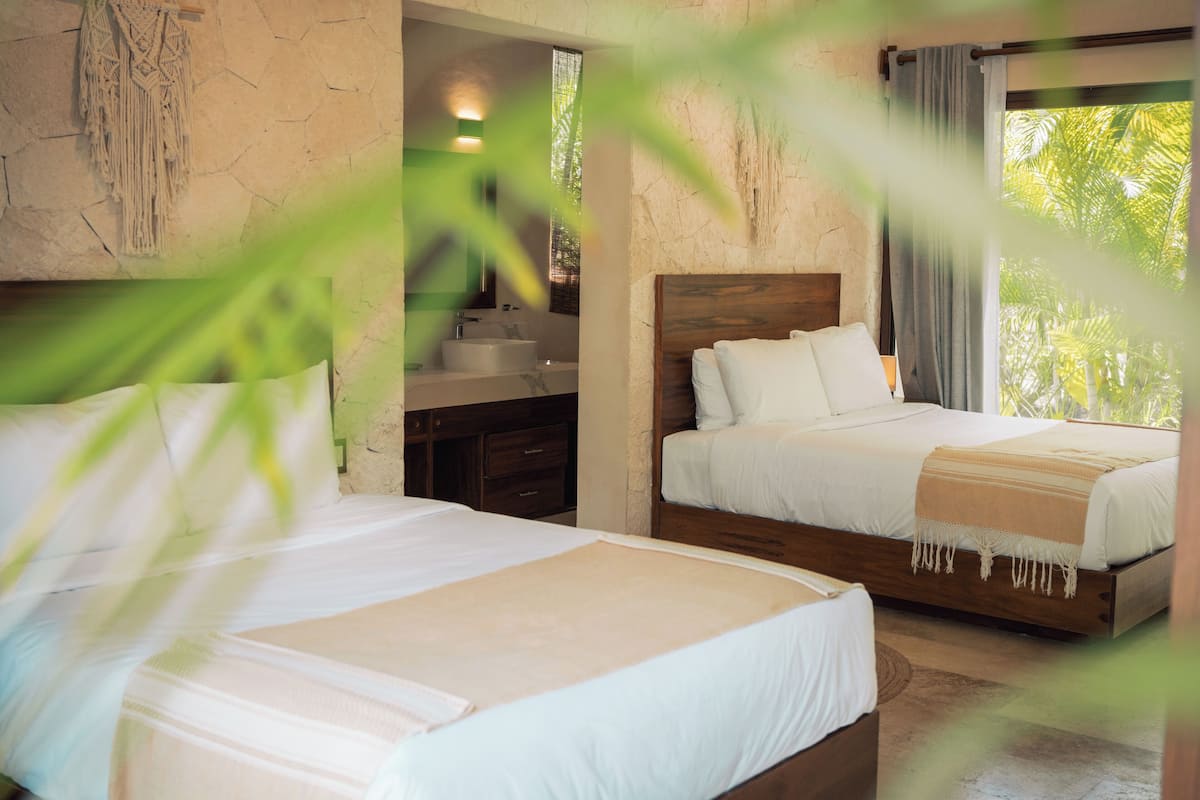 Garden Terrace Suite | Edredones de plumas, minibar, caja fuerte