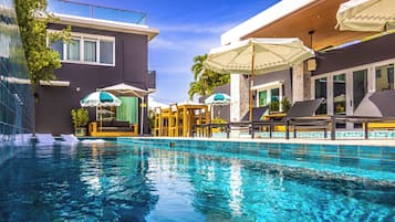 Outdoor pool, open 9:00 AM to 10:00 PM, pool loungers