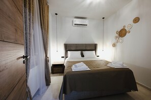 1 dormitori, planxa i posts de planxar, wifi i roba de llit