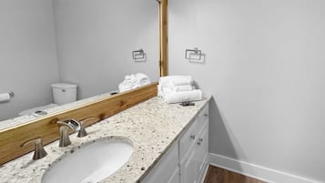 Hair dryer, towels, soap, toilet paper
