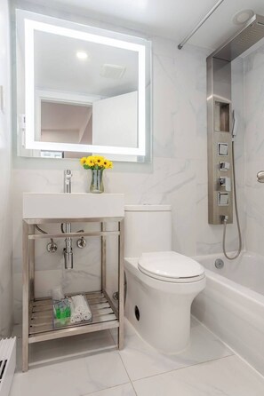 Shower, hair dryer, towels