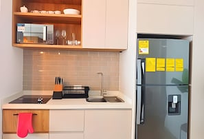 Fridge, microwave, coffee/tea maker, toaster