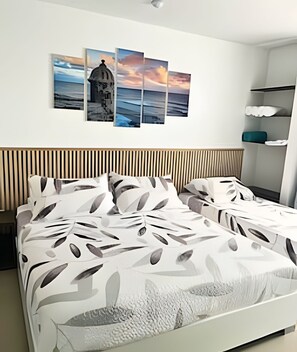 1 chambre, fer et planche à repasser, draps fournis