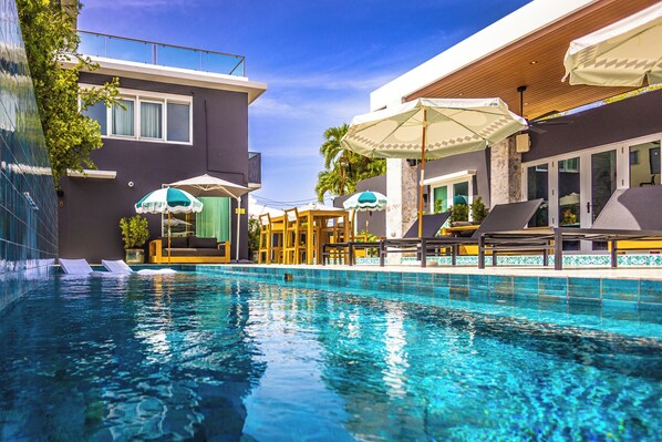 Outdoor pool, open 9:00 AM to 10:00 PM, sun loungers