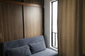 Living area - Adjacent apartments AREAS by QuBeLab (Bello)