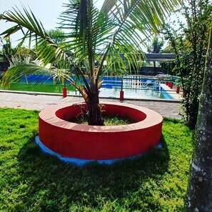 Pool - Tranquil AC Farmhouse with modern amenities in charming Puri with Activities. (Brahmagiri)