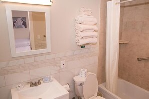 Classic Room, 1 King Bed | Bathroom | Free toiletries, hair dryer, towels, soap - Knotty Pine (Bennington)