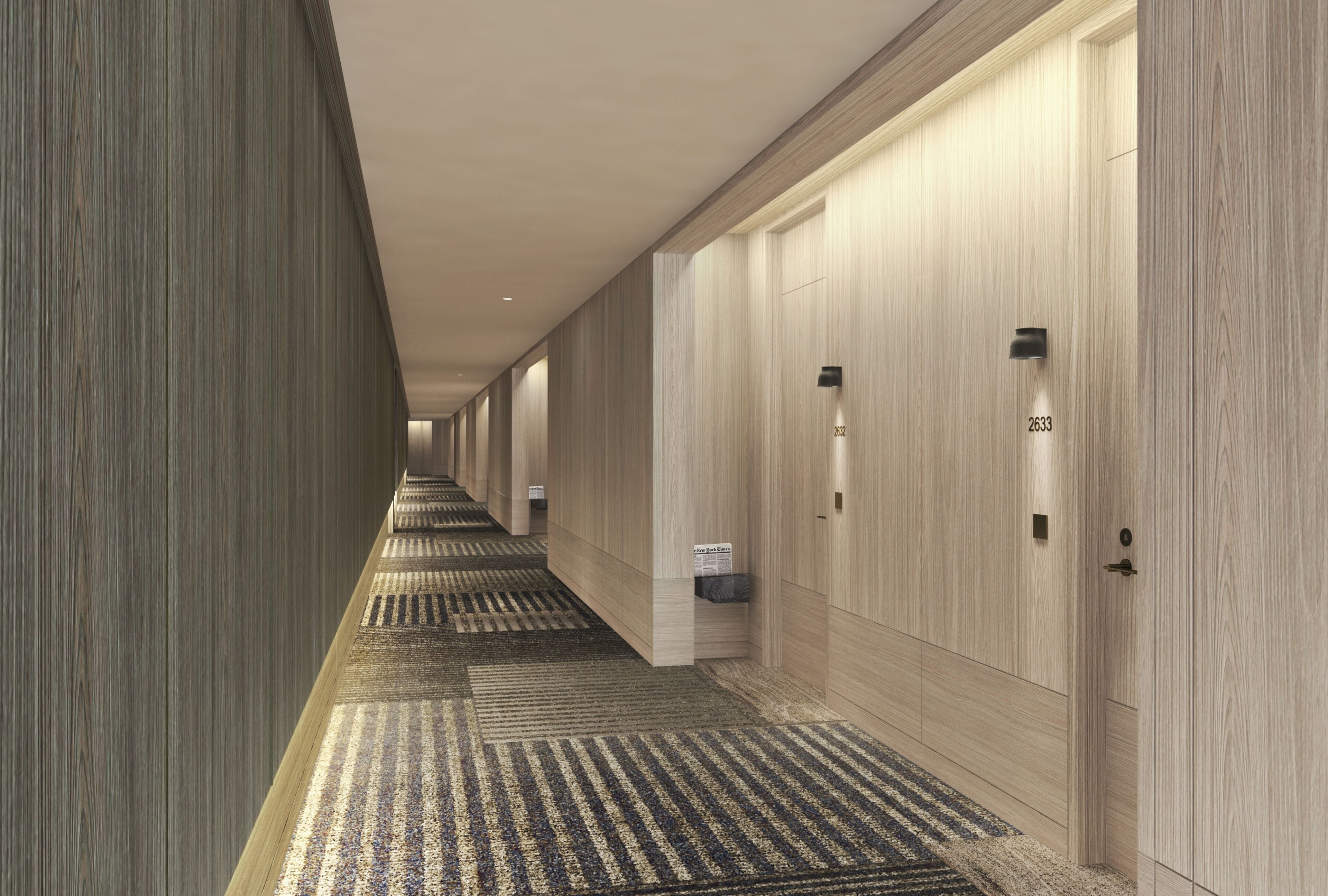 A long, narrow hotel corridor with wooden paneling on the walls and carpeted floors.