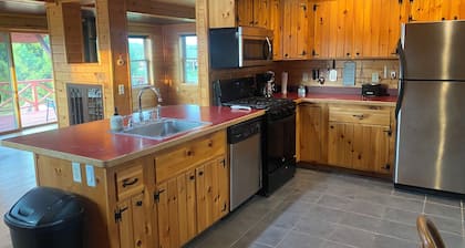 Charming 2-bedroom farmhouse in Hertel with AC and near lakes and trails