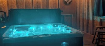 Relax with an enclosed hot tub and cozy island vibes in the heart of Summerside