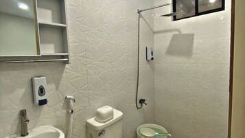 Hair dryer, towels, soap, shampoo