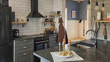 Réfrigérateur, plaque de cuisson, cafetiÚre/bouilloire