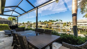 Outdoor dining - Luxurious Coastal Escape: Spacious Comfort Awaits (Marco Island)