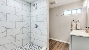 Hair dryer, towels, soap, toilet paper