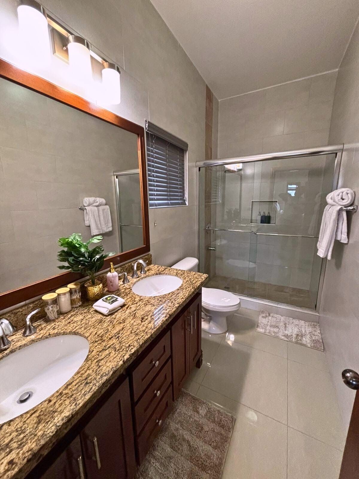Shower, eco-friendly toiletries, hair dryer, towels
