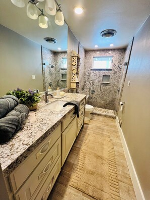 Shower, hair dryer, towels, soap