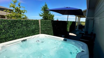 Condo de lujo, vista al parque | Tina de hidromasaje privada