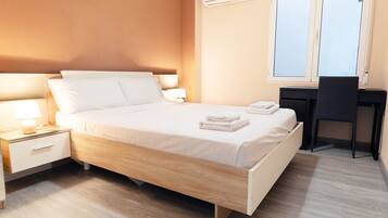 4 dormitorios, tabla de planchar con plancha, Internet y ropa de cama