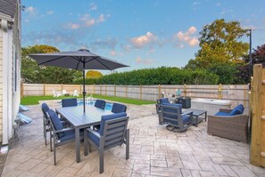 Outdoor dining - Brand New 5BR - Pool, Hot Tub, A/C – Walk to Beach, Main St. & Ferry - Sleeps 12 (Barnstable)