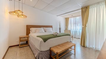 Deluxe Double Room | Pillowtop beds, minibar, individually decorated, blackout drapes