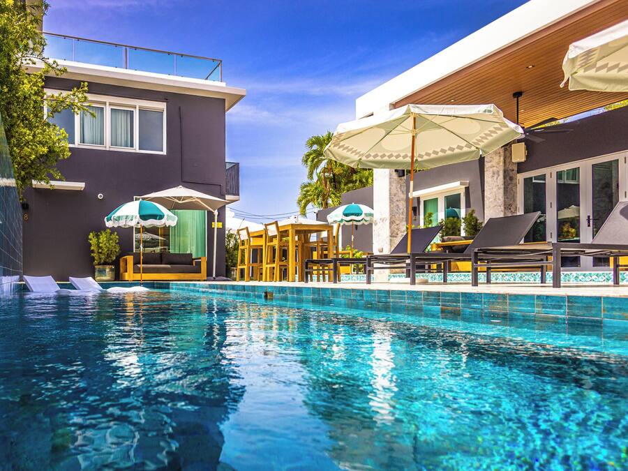 Outdoor pool, open 9:00 AM to 10:00 PM, pool loungers