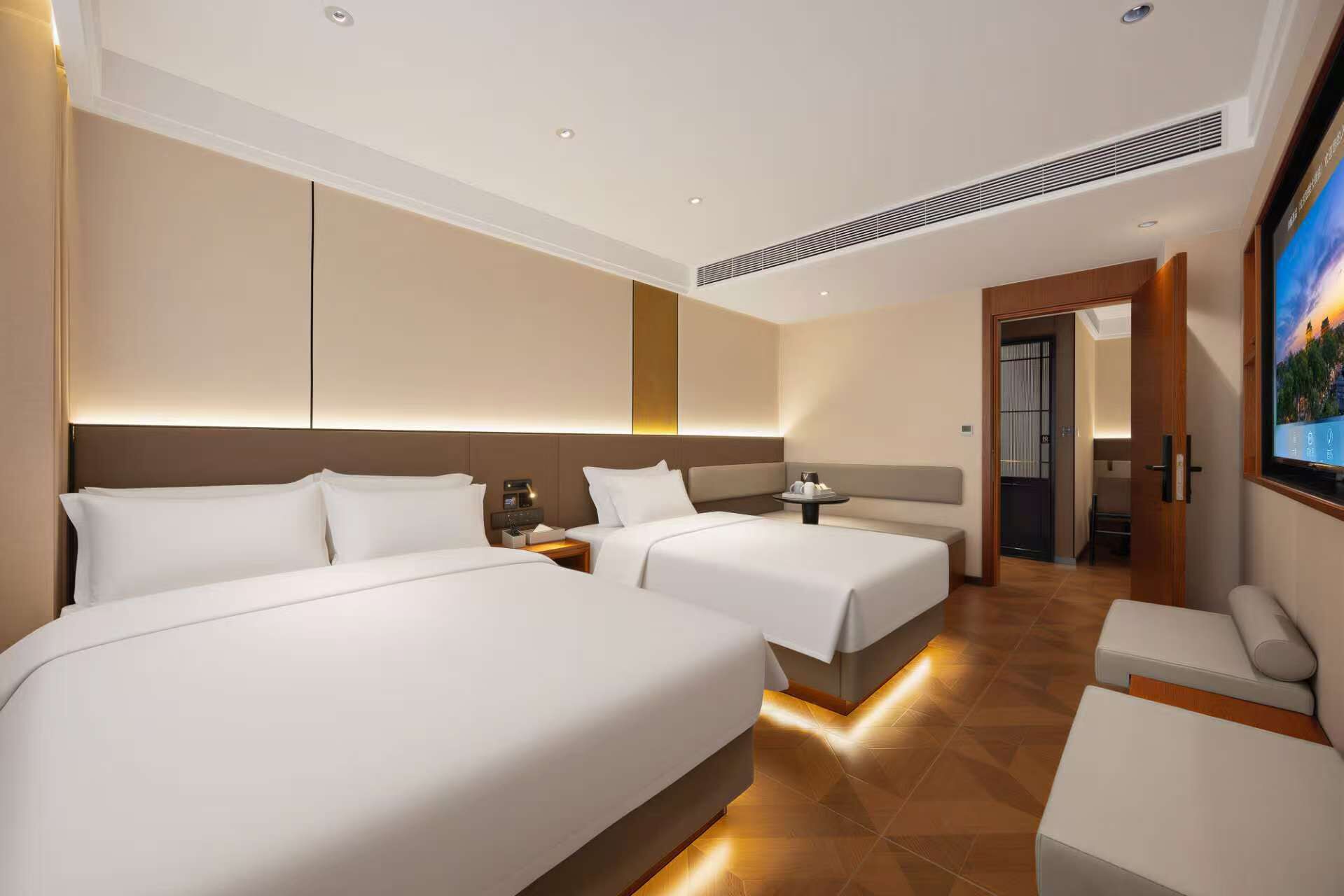 Suíte estúdio sênior | Wi-Fi de cortesia, roupa de cama