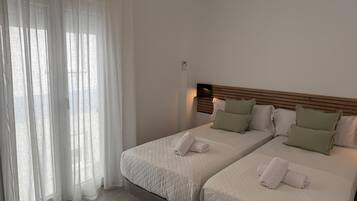 2 slaapkamers, een strijkplank/strijkijzer, internet, beddengoed