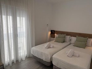 2 slaapkamers, een strijkplank/strijkijzer, internet, beddengoed