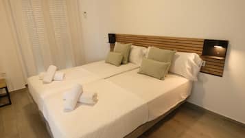 2 slaapkamers, een strijkplank/strijkijzer, internet, beddengoed