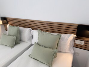 2 slaapkamers, een strijkplank/strijkijzer, internet, beddengoed