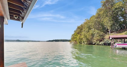 Serene cottage with fishing dock, lake views, deck, AC and kayak