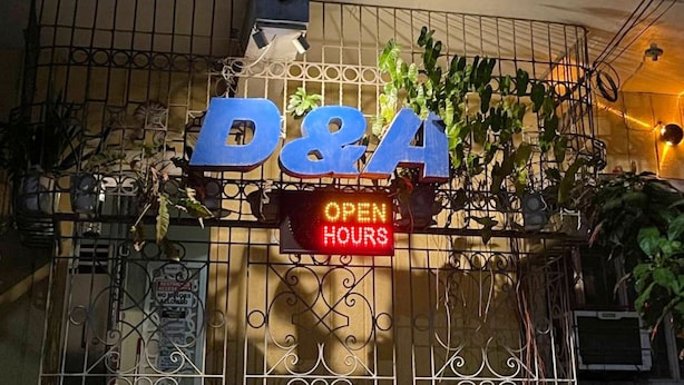 A storefront with a large 'D&A' sign and an 'OPEN HOURS' sign. - D and A Transient Inn Taguig (Taguig)