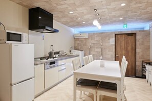 Fridge, microwave, cookware/dishes/utensils