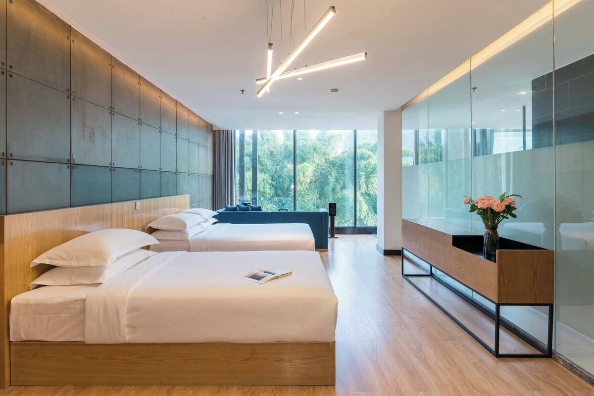Suíte família | Roupas de cama premium, edredons de pluma, frigobar