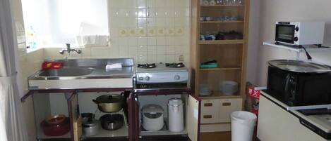 Fridge, microwave, stovetop, cookware/dishes/utensils