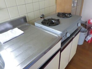 Fridge, microwave, stovetop, cookware/dishes/utensils