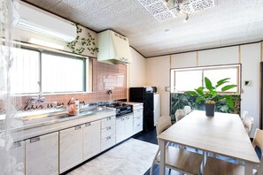 Fridge, microwave, stovetop, cookware/dishes/utensils
