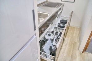 Fridge, microwave, stovetop, cookware/dishes/utensils